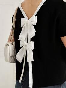 Gloray Camiseta de mujer con cuello redondo y manga corta, con decoración de lazo en la espalda