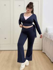CovetEZ 大码性感极简瑜伽套装。瑜伽长袖外套、吊带背心、交叉腰带瑜伽裤。 - 藏蓝色 - 查看 4