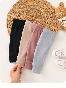 SHEIN 4 قطع بنطلونات مرنة بخصر مضفر للأطفال الرضع البنات ذات لون أحادي، متعددة الاستخدامات للخريف والشتاء - متعدد الألوان - مشاهدة 2