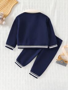 Cozy Pixies Bộ 2 món đồ cho bé trai gồm áo nỉ cổ tròn và quần cạp chun in hình gấu hoạt hình. - Màu xanh hải quân - Xem 2