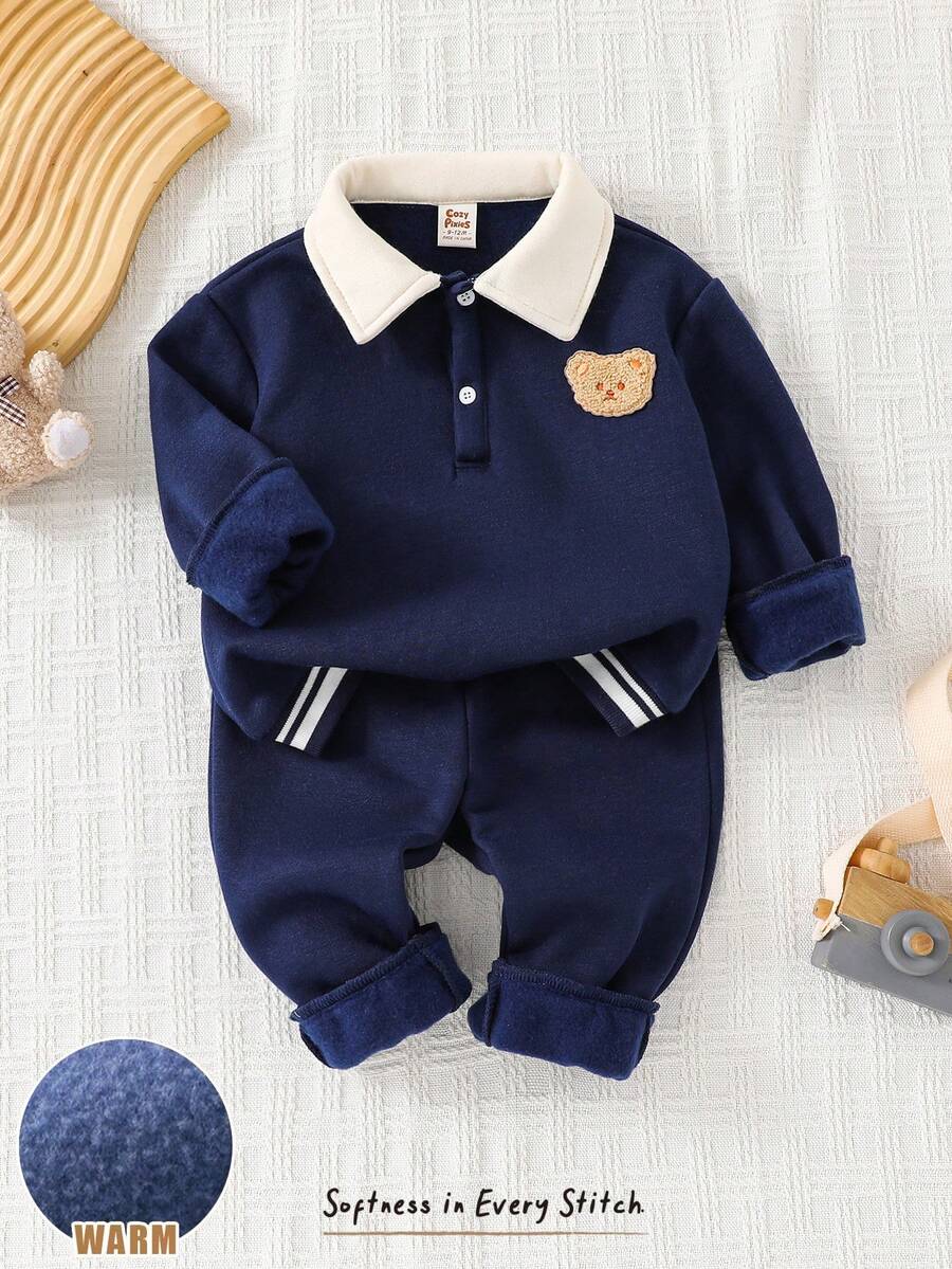 Cozy Pixies Bộ 2 món đồ cho bé trai gồm áo nỉ cổ tròn và quần cạp chun in hình gấu hoạt hình. - Màu xanh hải quân - Xem 1