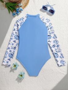 SHEIN 女童长袖印花连体泳衣，适合水疗中心、度假村和海滩穿着。