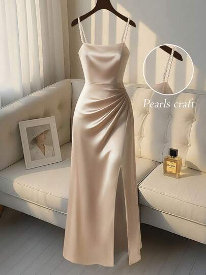 SHEIN Franclia Lady's Elegant And Gentle Apricot Satin Strap Chain Split Long Dress, Featuring Satin Fabric That Presents A Smooth And Glossy Finish, Adorned With Diamond Chain Strap Decoration And Side Split Design, With A Drooping Silhouette Suitable For Spring And Summer Dates, Light Dress Occasions. Product Features Include: Women's Satin Long Dress, Gentle Apricot Temperament Long Dress, Diamond Chain Strap Long Dress, Side Split Slimming Long Dress, Light Dress Wind Long Dress, Romantic Long Dress For Dates.