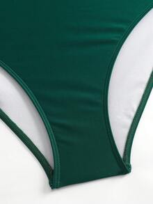 Swim Oasis Maillot de bain une pièce style européen et américain de grande taille, couleur unie, style col ras-du-cou. Jupe de plage imprimée de feuilles conservatrice couvrant le ventre avec une jupe enveloppante en maille