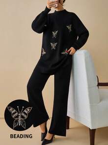 EURMUSE Black Knit Co-Ord Set With Rhinestone Butterfly Embroidery – Casual Elegance Black Rhinestone Butterfly Knit Sweater And Pants Set For Elegant Chic Fall And Winter Outfits - Black - View 1