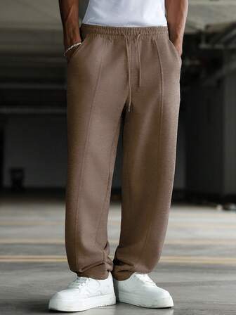 Manfinity Hypemode Młodzieżowe, casualowe, jednokolorowe, patchworkowe spodnie dresowe dla mężczyzn