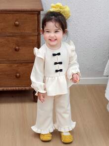 DAZY Toddler Girls' Round Neck Bow Tie Cap Sleeve Thermal Lined Sweatshirt And Flare Leg Pants Set