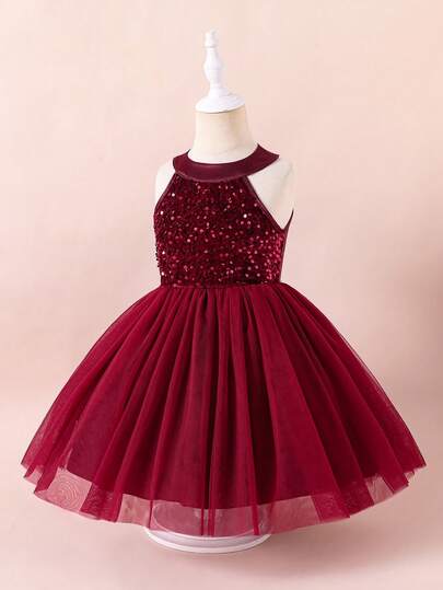 Glamorique Kids 一件女童红色露背连衣裙，上半身饰有亮片，下半身是蓬松的薄纱裙，适合表演、宴会和其他正式场合，展现童真和优雅。