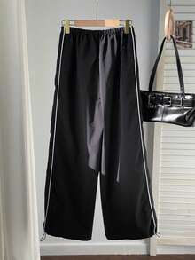 SHEIN EZwear Pantalones casuales de pierna ancha y longitud a los tobillos para mujer estilo callejero con bloques de color y detalles de borde deshilachado - Negro - Ver 2