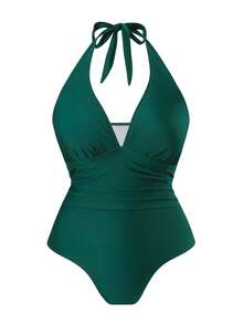 Swim Oasis Maillot de bain une pièce style européen et américain de grande taille, couleur unie, style col ras-du-cou. Jupe de plage imprimée de feuilles conservatrice couvrant le ventre avec une jupe enveloppante en maille