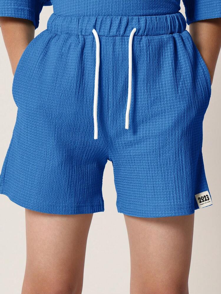 Ensemble polo et short texturé
