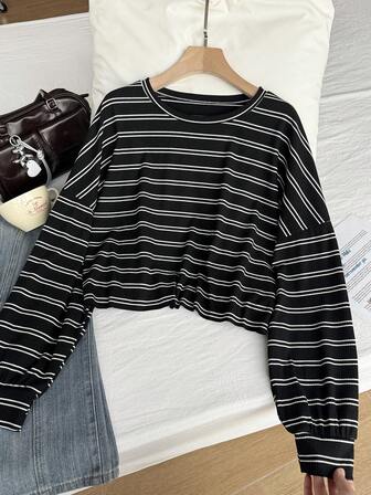 Camiseta de hombros caídos de rayas