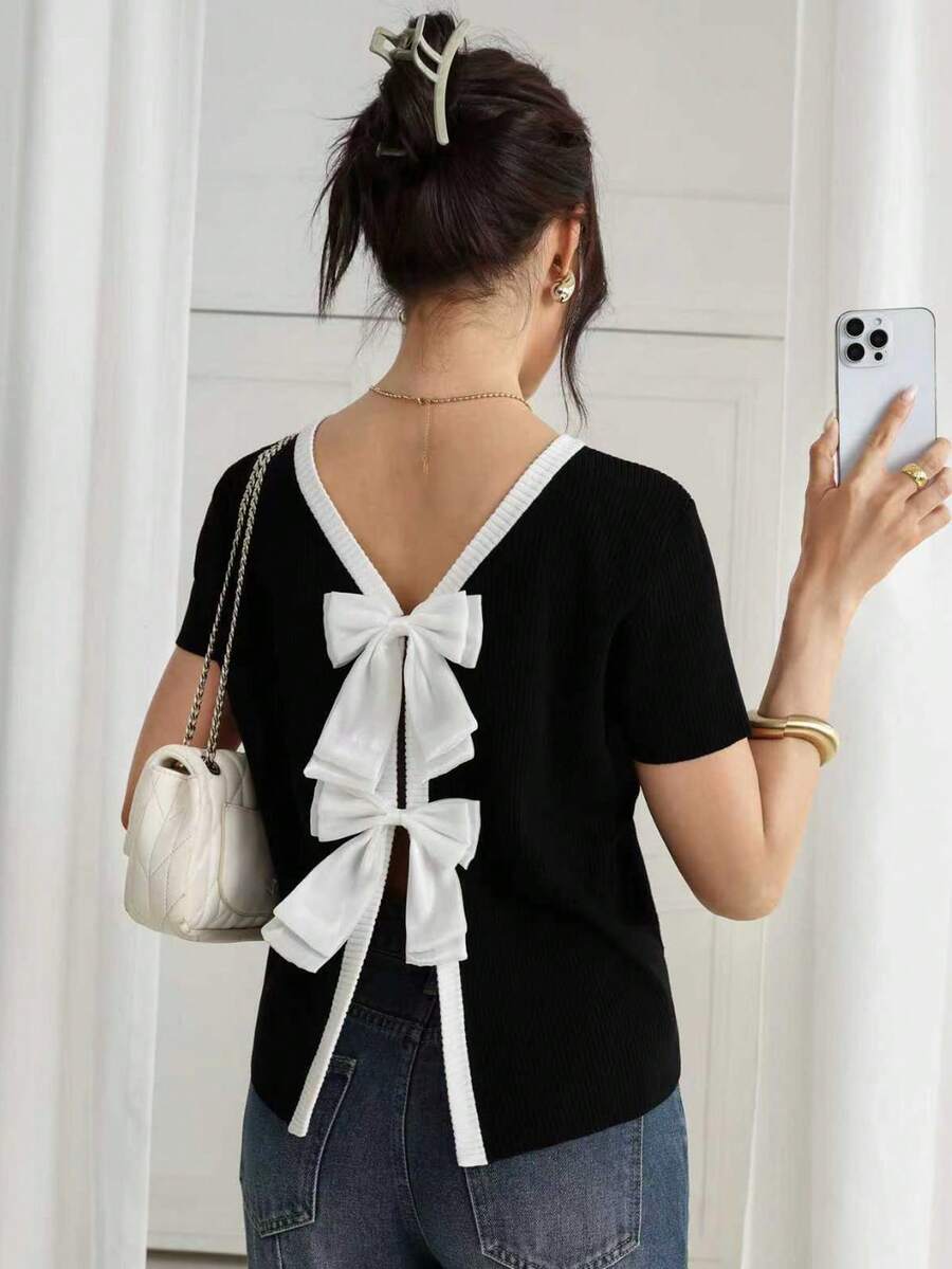 Gloray Camiseta de mujer con cuello redondo y manga corta, con decoración de lazo en la espalda