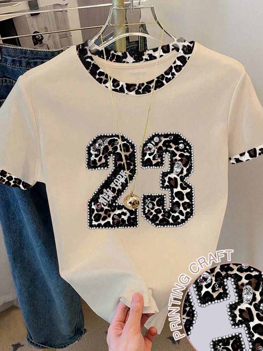 Resyla Camiseta de manga corta casual y versátil para vacaciones con cuello redondo, estampado de leopardo y de dígitos con rhinestones para mujer - verde menta - Ver 1