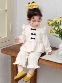 DAZY Toddler Girls' Round Neck Bow Tie Cap Sleeve Thermal Lined Sweatshirt And Flare Leg Pants Set