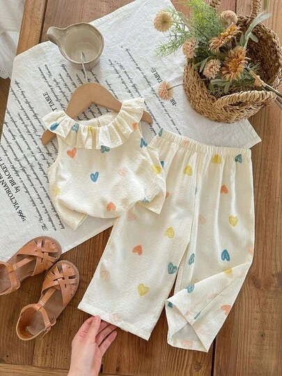 This 2 Pieces Cute Baby Girl Woven Floral Ruffle Top And Loose-Fitting Trousers Set Is Suitable For Birthday Parties, Evening Parties, Performances, Weddings, Baptisms, School Ceremonies, School Trips, And Spring/Summer.