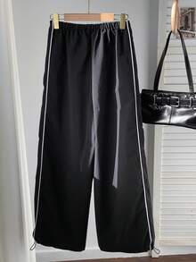 SHEIN EZwear Pantalones casuales de pierna ancha y longitud a los tobillos para mujer estilo callejero con bloques de color y detalles de borde deshilachado - Negro - Ver 6