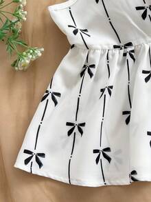 Soleia A字型短袖女式衬衫，图案精美，适合度假、音乐节、波西米亚风、假日、下午茶等场合。 - 黑與白 - 查看 6