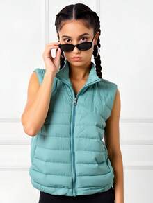 Chaleco corto, afelpado y acolchado para mujer, clásico, casual y elegante, multicolor, tela de poliéster, apto para temporadas de otoño e invierno. Cuello alto, sin mangas. Interior afelpado, cálido, suave y muy cómodo. Ajuste regular con cremallera. Bolsillos frontales funcionales. Te llegará un chaleco en color al azar. - Multicolor - Ver 3