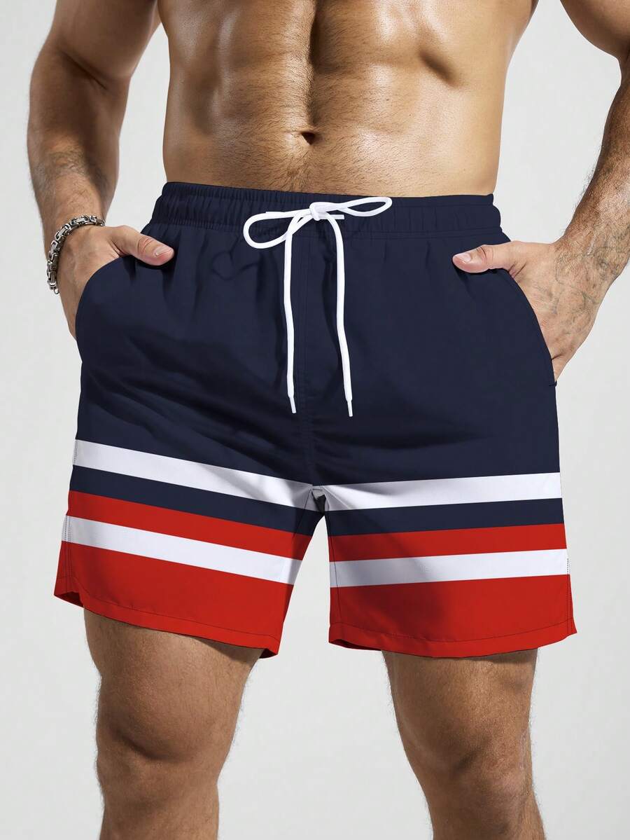 Manfinity Swimmode Pantalones cortos de playa de estilo de vacaciones de verano para hombres con cintura con cordón, bolsillo en diagonal y estampado de rayas de contraste. Bañadores de hombre rojos, blancos y azules - Azul Marino - Ver 1