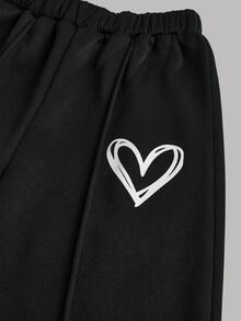 SHEIN 少女休闲爱心印花针织纯白色宽松落肩长袖卫衣搭配纯黑色阔腿运动裤套装，适合秋冬季日常穿着。 - 黑與白 - 查看 5
