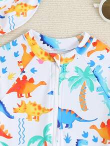 SHEIN Toddler Boys' Swimsuit, Cute Cartoon Dinosaur Print Long Sleeve One-Piece Swimwear With Sun Hat, Suitable For Summer Vacation, Beach, Surfing, Water Park - Multicolor - View 3