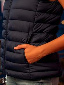 Chaleco corto, afelpado y acolchado para mujer, clásico, casual y elegante, tela de poliéster, apto para temporadas de otoño e invierno. Cuello alto, sin mangas. Interior afelpado, cálido, suave y muy cómodo. Ajuste regular con cremallera. Bolsillos frontales funcionales. - Negro - Ver 4