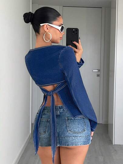 Jeanoix Dammode, avslappnad långärmad denimblus med knytning baktill