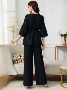 Al Najma 女士几何刺绣七分喇叭袖娃娃衫上衣及宽松阔腿裤阿拉伯风格套装，春夏秋季 - 黑色 - 查看 2