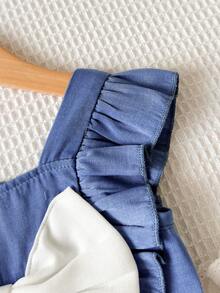 SHEIN Bộ áo liền quần tay bồng trang trí nơ, kiểu dáng thường ngày, thích hợp cho bé gái đi chơi, dự tiệc, du lịch và mặc hàng ngày vào mùa xuân/hè. - Màu xanh lam - Xem 8