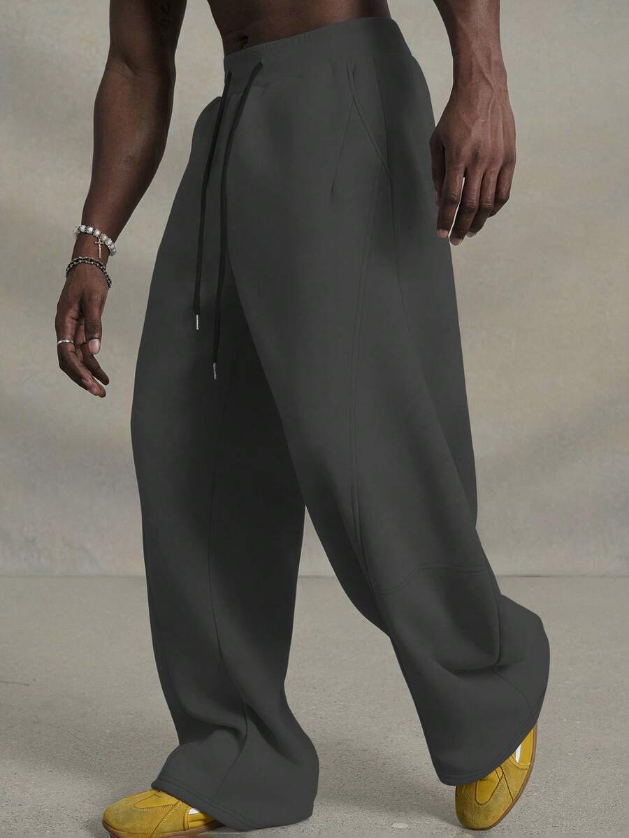 PAVTROS Pantalones deportivos casuales de hombre de unicolor con cordón ajustable en la cintura y bolsillos, corte amplio - Gris Oscuro - Ver 1