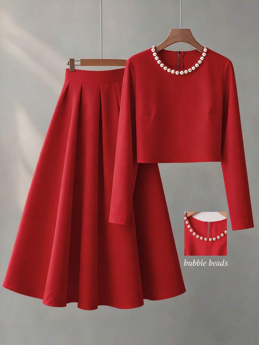 Franclia Bộ đồ thanh lịch áo thun tay dài cổ tròn đính ngọc trai giả màu trơn và chân váy midi xếp ly cho nữ - Đỏ - Xem 1