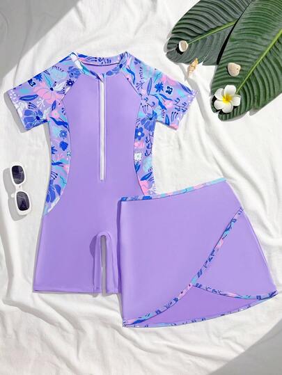 SHEIN Traje de baño de una pieza con cremallera frontal para niñas preadolescentes, estampado floral de manga corta, pantalones cortos negros con estampado floral de corte lateral, conjunto de 2 piezas con falda cruzada por delante