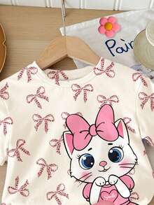 SHEIN Bộ đồ cho bé gái gồm áo thun tay ngắn cổ tròn dáng rộng màu trắng kem và hồng kem, họa tiết mèo hoạt hình dễ thương, nơ báo, cùng quần short bó sát, thích hợp mặc hàng ngày vào mùa xuân/hè, đi chơi, phối đồ, ở nhà, đi nghỉ mát. - Nhiều màu - Xem 4