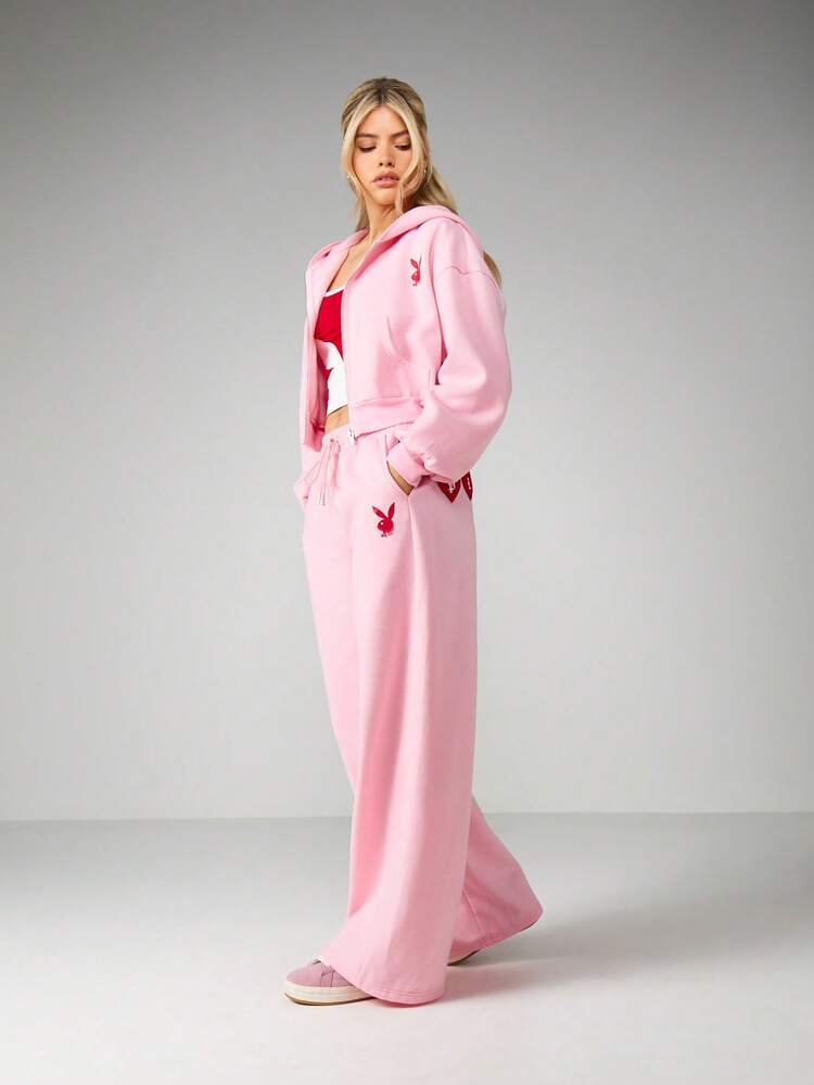 Missguided x Playboy Pantalon de jogging à jambes larges avec appliqué en forme de cœur, taille avec cordon de serrage et poches latérales pour un confort casual
