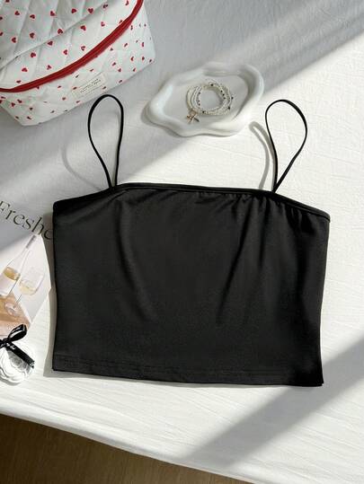 Top corto con bretelle sottile monocolore