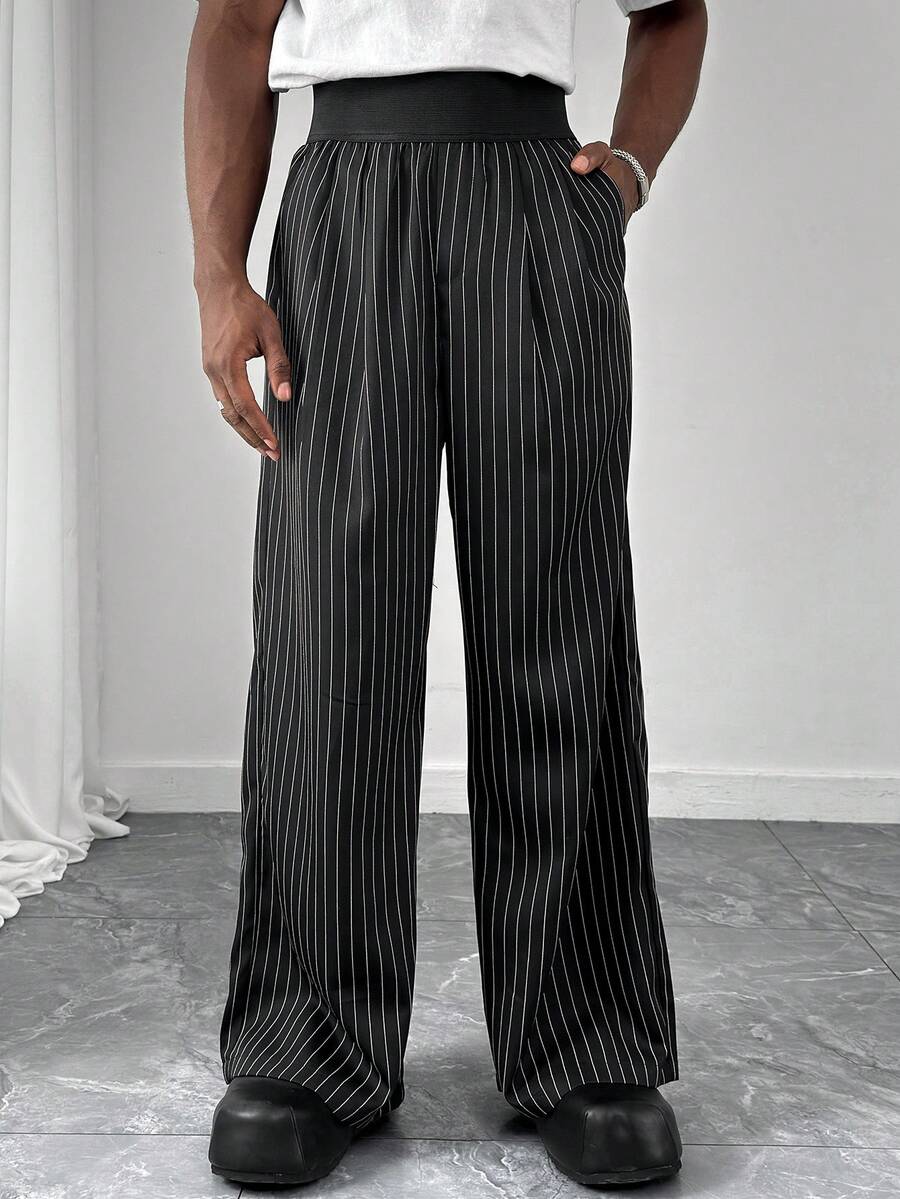 HUEFORM Pantalones rectos de corte relajado de unicolor con cintura elástica para hombre, pantalones anchos de pierna suelta de unicolor con costura frontal, pantalones anchos versátiles en negro oversize, regalos para novio, ropa urbana para hombre, pantalones anchos a rayas para uso casual, pantalones de rayas para hombre, pantalones plisados para hombre, pantalones anchos de rayas para hombre, pantalones anchos plisados para hombre - Negro - Ver 1