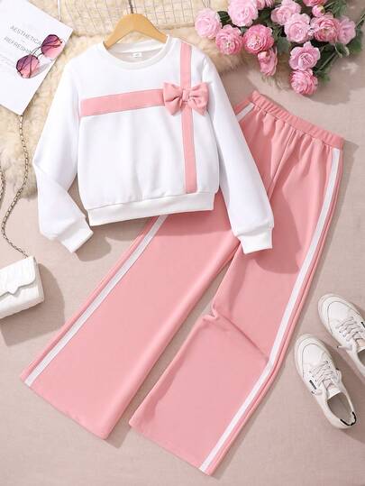 SHEIN Bộ 2 áo nỉ dài tay cổ tròn phối màu phong cách học sinh cho bé gái và quần dài thoải mái, trang phục trở lại trường với màu sắc tương phản và chi tiết nơ, thiết kế trẻ trung và năng động, thích hợp mặc đi học hoặc thường ngày