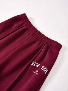 SHEIN Bộ đồ nữ 2 món, mẫu mới Thu/Đông, áo hoodie cổ đứng màu đỏ rượu vang có khóa kéo, phối cùng quần dài tay bo gấu, in chữ LA, thoải mái thường ngày, đồ đôi mẹ con. - Màu đỏ tím - Xem 5