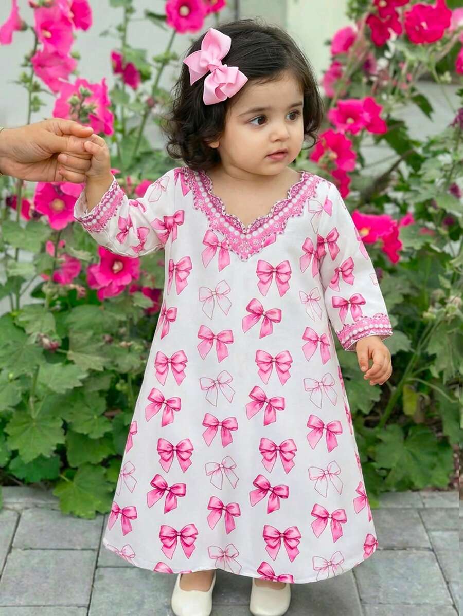 SHEIN Baby Girl's White And Pink Long-Sleeved Dress,Cute Bow Print V-Neck,Autumn Party Arabic Abaya,Elegant Loose-Fitting Prayer Dress For Spring - Pink - View 1