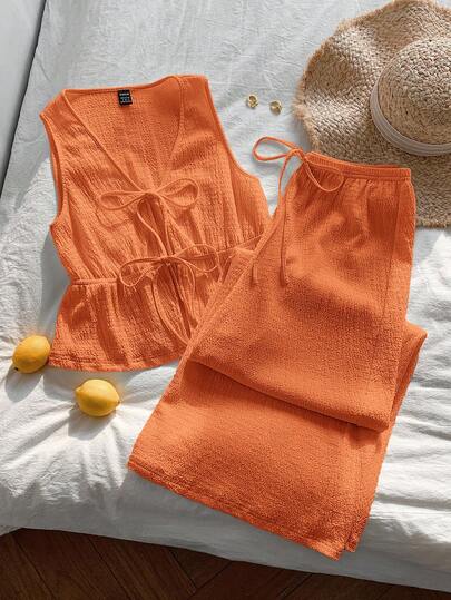 Comfortcana ชุดเสื้อกล้ามถักลายสีส้มผูกด้านหน้าและกางเกงสำหรับผู้หญิง ชุดลำลองสำหรับใส่ไปเที่ยวในฤดูใบไม้ผลิ/ฤดูร้อน