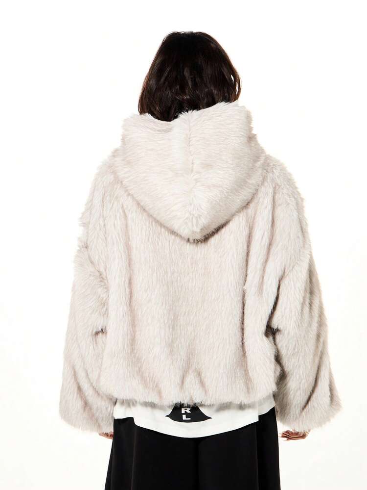 SUMWON WOMEN Chaqueta con capucha de piel sintética oversize, abrigo de invierno esponjoso y mullido, prenda exterior de manga larga, cálida y de moda, una declaración de estilo