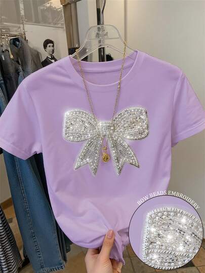 Franclia Women's Regular Short Sleeve Round Neck T-Shirt With Elegant Bow Tie & Sequin Decor