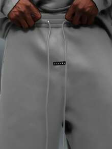 PLAYBOY X SUMWON Pantalon de survêtement super large avec taille à cordon et détails de poche arrière pour un confort casual quotidien - Gris - Voir 7