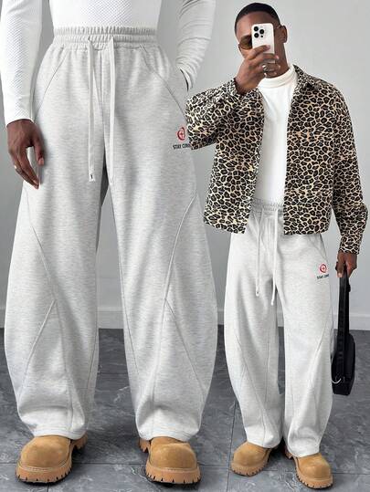 HUEFORM Men's Drawstring Waist  Relaxed Fit Fleece Patchwork Curved Blade Design  Sweatpants ,The Embroidery Patterns Have More Design Elements 
Suitable For Both Street Style And Home Wear For Men Manfinity Sweatpants