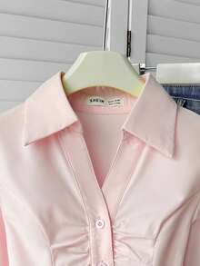 SHEIN قميص بأكمام طويلة مطوي الياقة مناسب للفتيات المراهقات، بأسلوب كاجوال وأنيق، مزين بأزرار أمامية، مناسب للعودة إلى المدرسة والمنزل والخروجات والحفلات وأكثر - وردي فاتح - مشاهدة 6