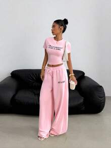 SHEIN EZwear Women's Slogan Print Round Neck Short Sleeve Fitted T-Shirt And Drawstring Waist Wide Leg Pants Casual 2-Piece Set Outfits 2 Piece Set Women 2 Piece Sets Summer - Pink - View 1
