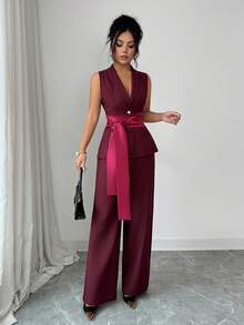 Elenzga Bộ trang phục thanh lịch và tinh tế dành cho nữ, gồm áo sơ mi không tay cổ chữ V màu đỏ tía, cài một hàng khuy, có thắt lưng, kết hợp với quần ống rộng. Thích hợp cho sinh nhật, hẹn hò, tiệc tùng, các dịp trang trọng, tiệc cocktail, lễ hội âm nhạc, Ngày Valentine, Lễ Phục sinh, Ngày động, tiệc tựu trường, tiệc độc thân, và mùa xuân. - Màu đỏ tím - Xem 7