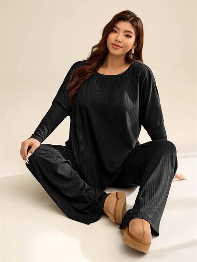 Auralis Plus Size Women Solid Color Batwing Sleeve T-Shirt And Pants Casual 2-Piece Set/Crew Neck Black Ribbed Plus Size Loose Long-Sleeved T-Shirt & Straight Leg Pants / Plus Size Comfortable Casual High-Elastic Two-Piece Set / Home / Sports / Sleeve Pockets For A Slimming Effect / Spring Casual Outfit Women Spring Two Piece Set For Women