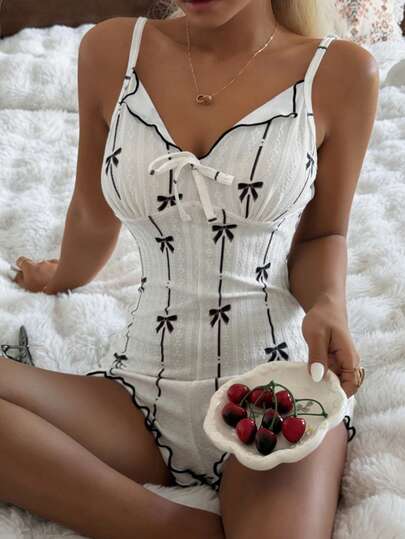 CottageSlumber Vit krage U-ringad jumpsuit med fluga och rygglös design för kvinnor